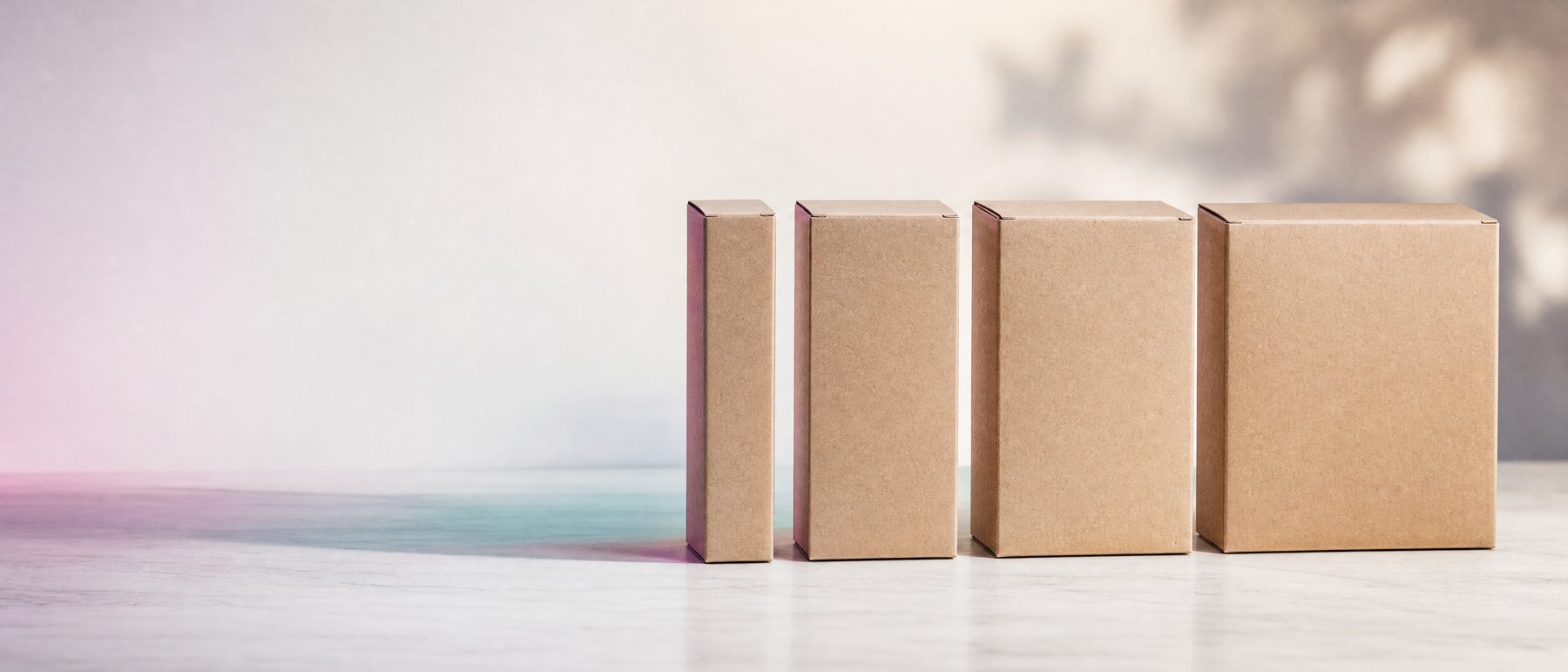 Condom boxes lined up from small to large sizes